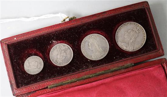 A maundy set, in original leather case. The case is dated 1897, the coins are dated 1890.